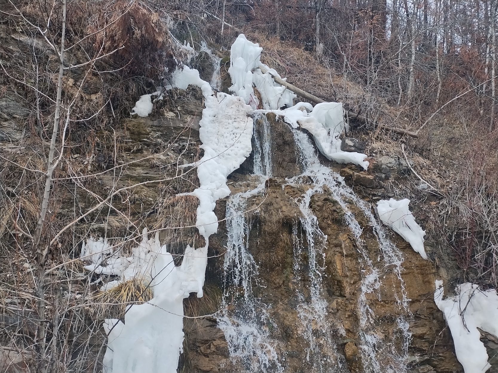 Melting snow waterfall